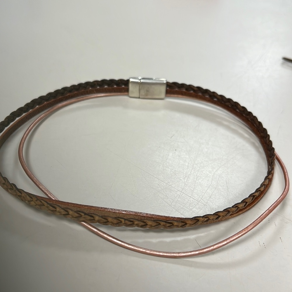 Magnetic corded bracket